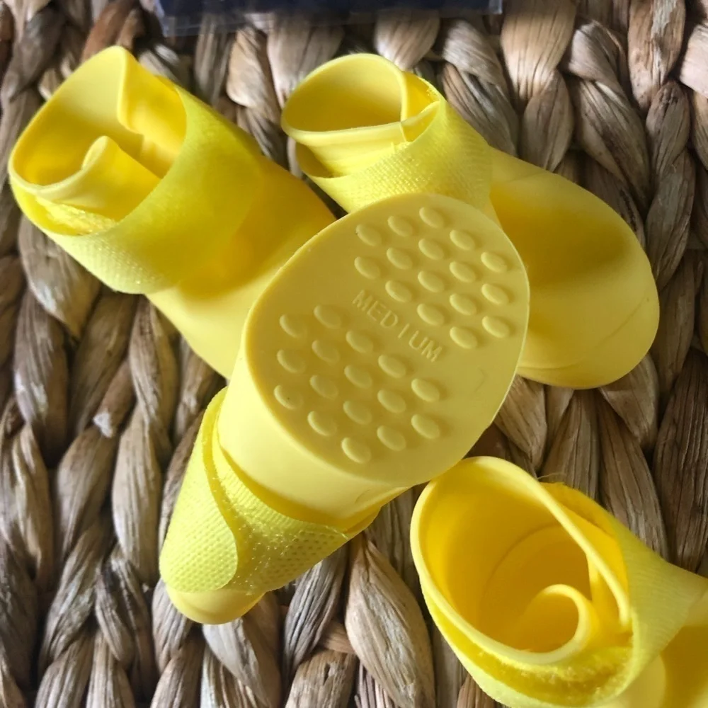 Yellow pet rain boots in size M